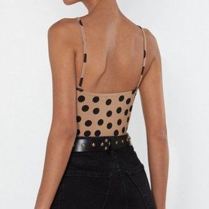 tan and black polka dot bodysuit